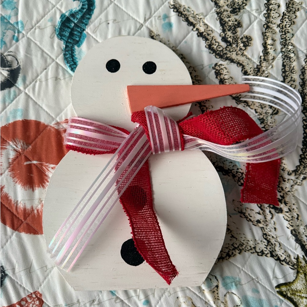 Festive Snowman Ornament with Red and White Accents